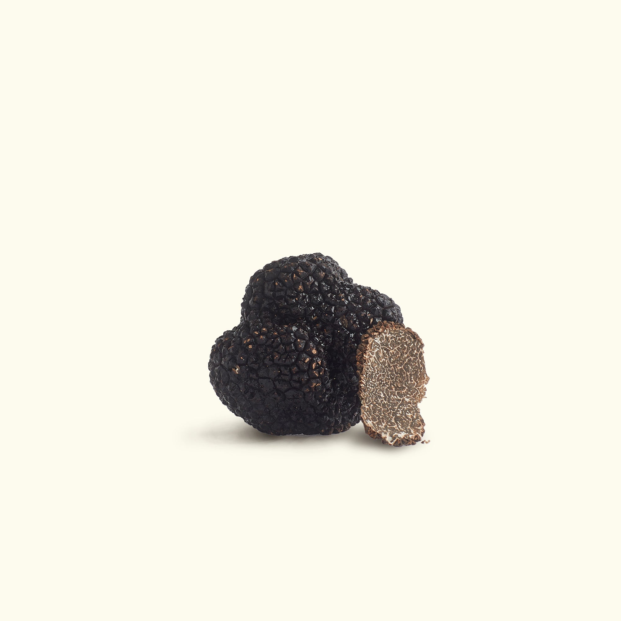 a piece of blackberries with a bite taken out of it