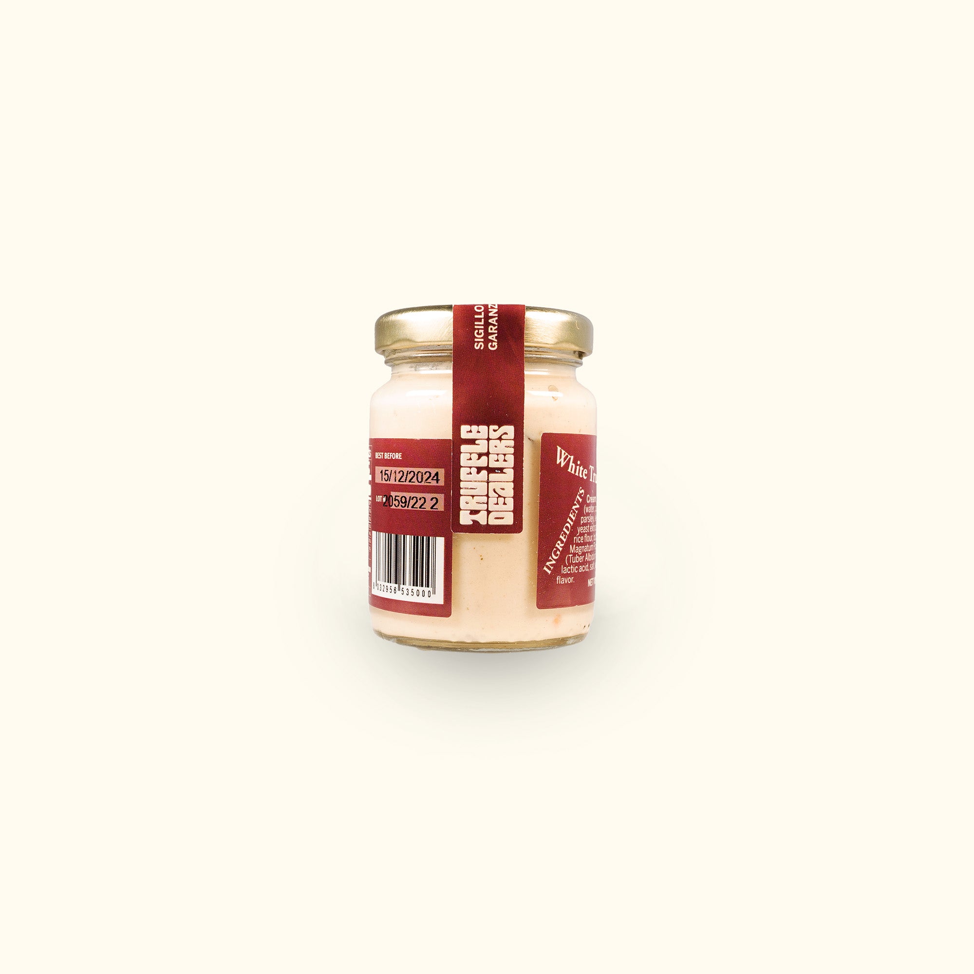 a jar of food sitting on top of a white table