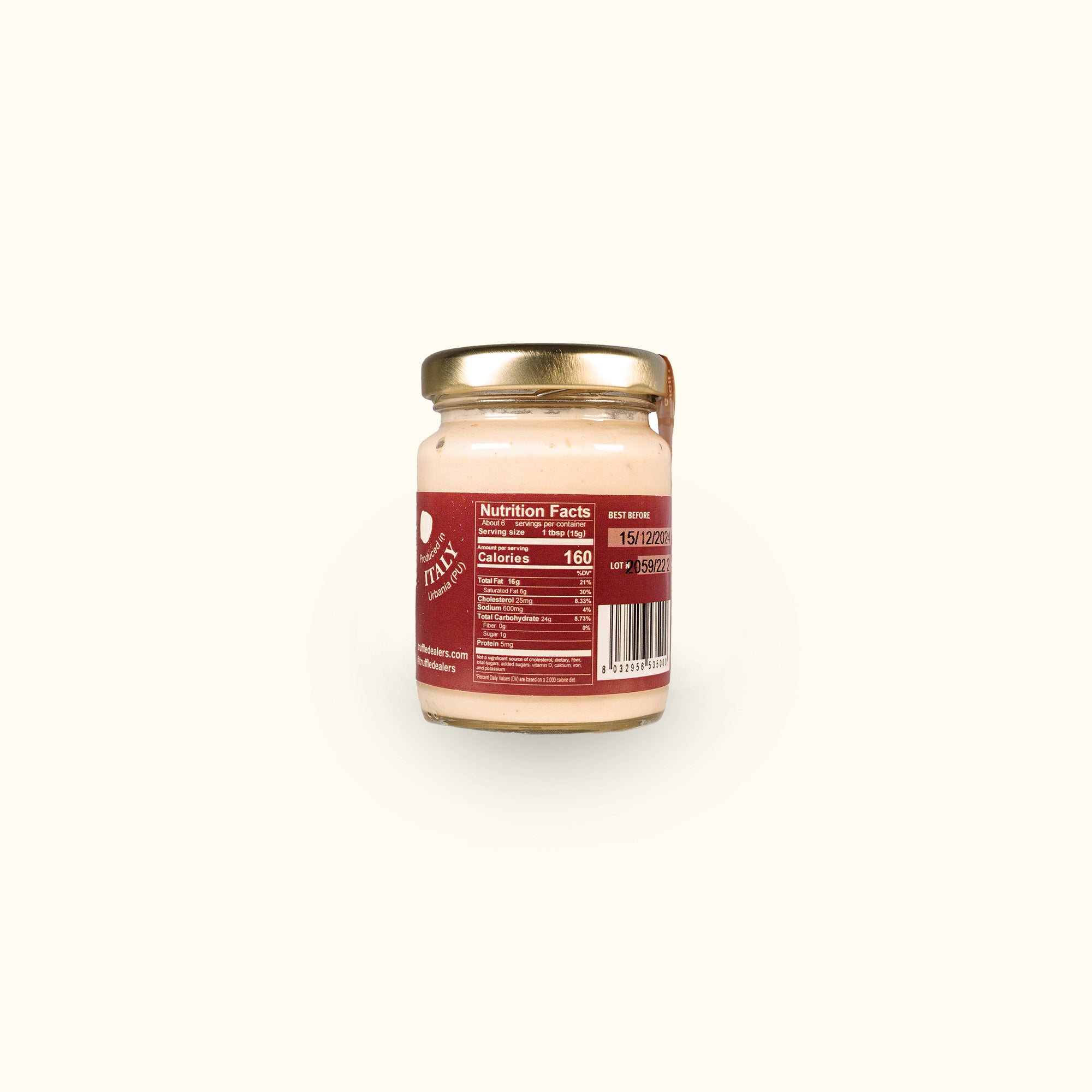 a jar of food sitting on top of a white table