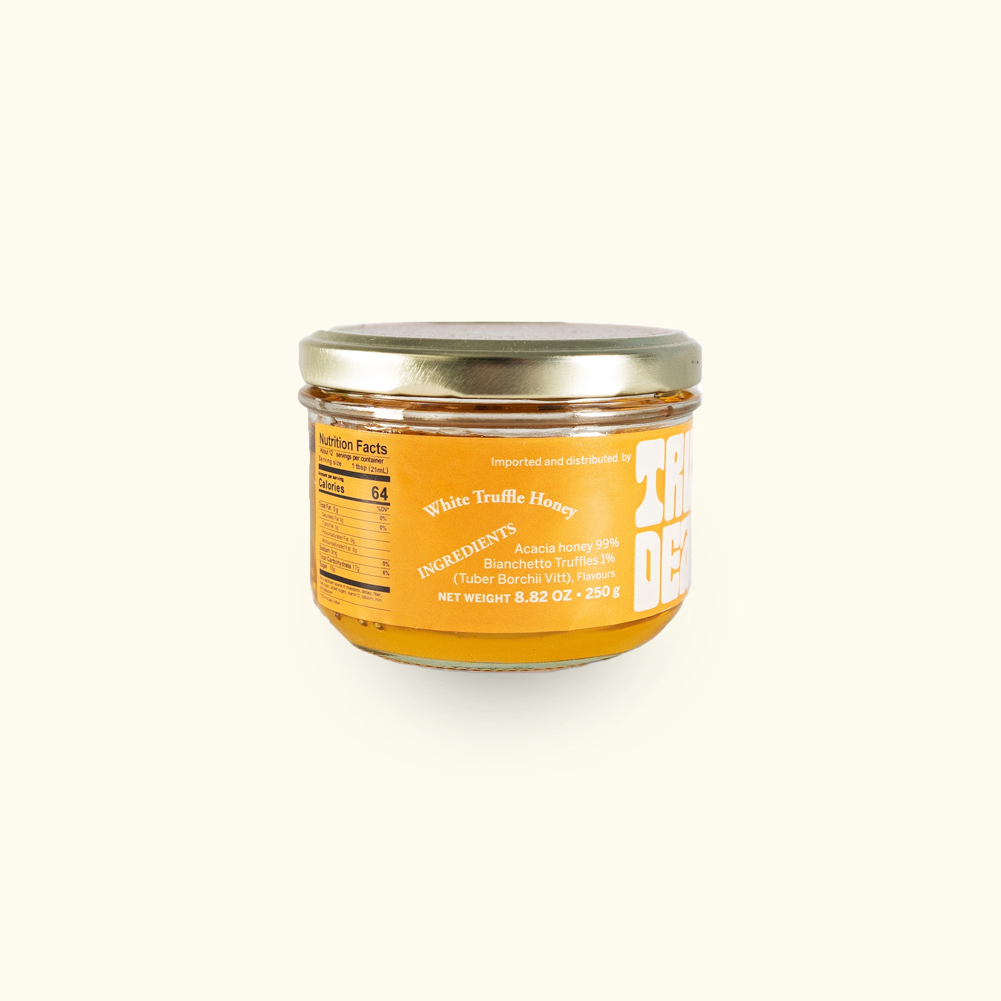 a jar of honey on a white background