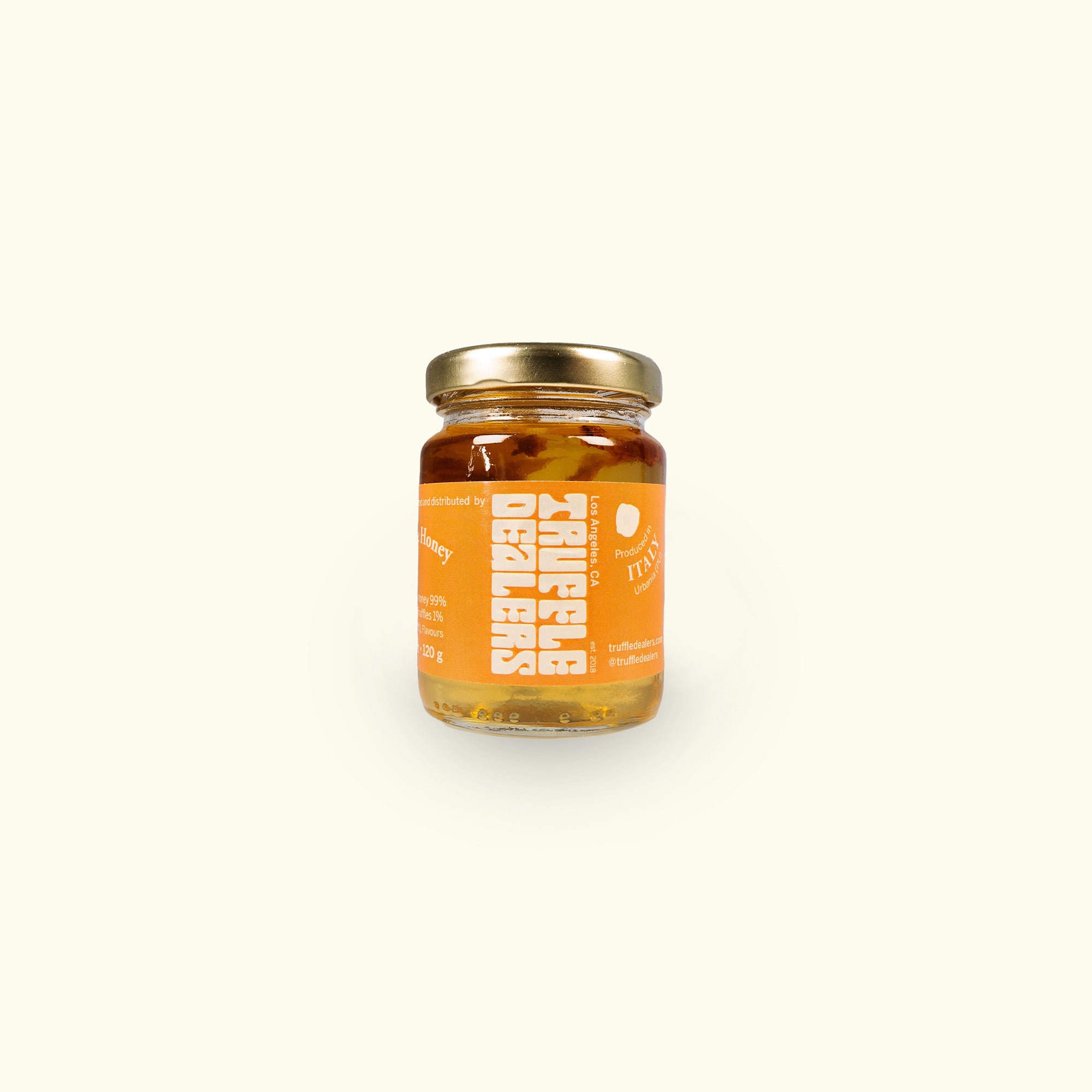 a jar of honey on a white background