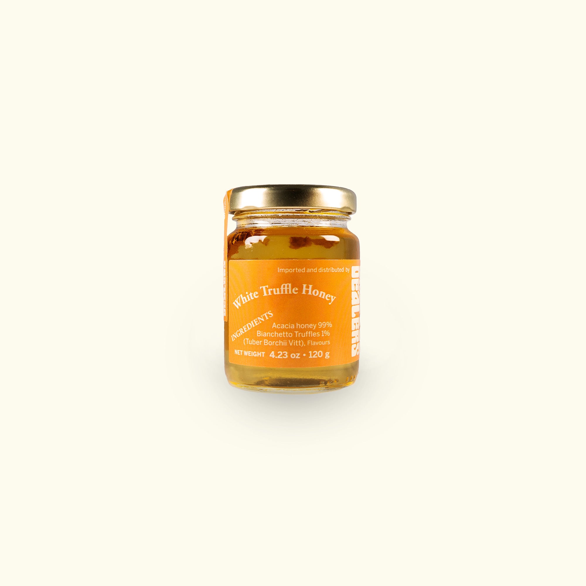 a jar of honey on a white background