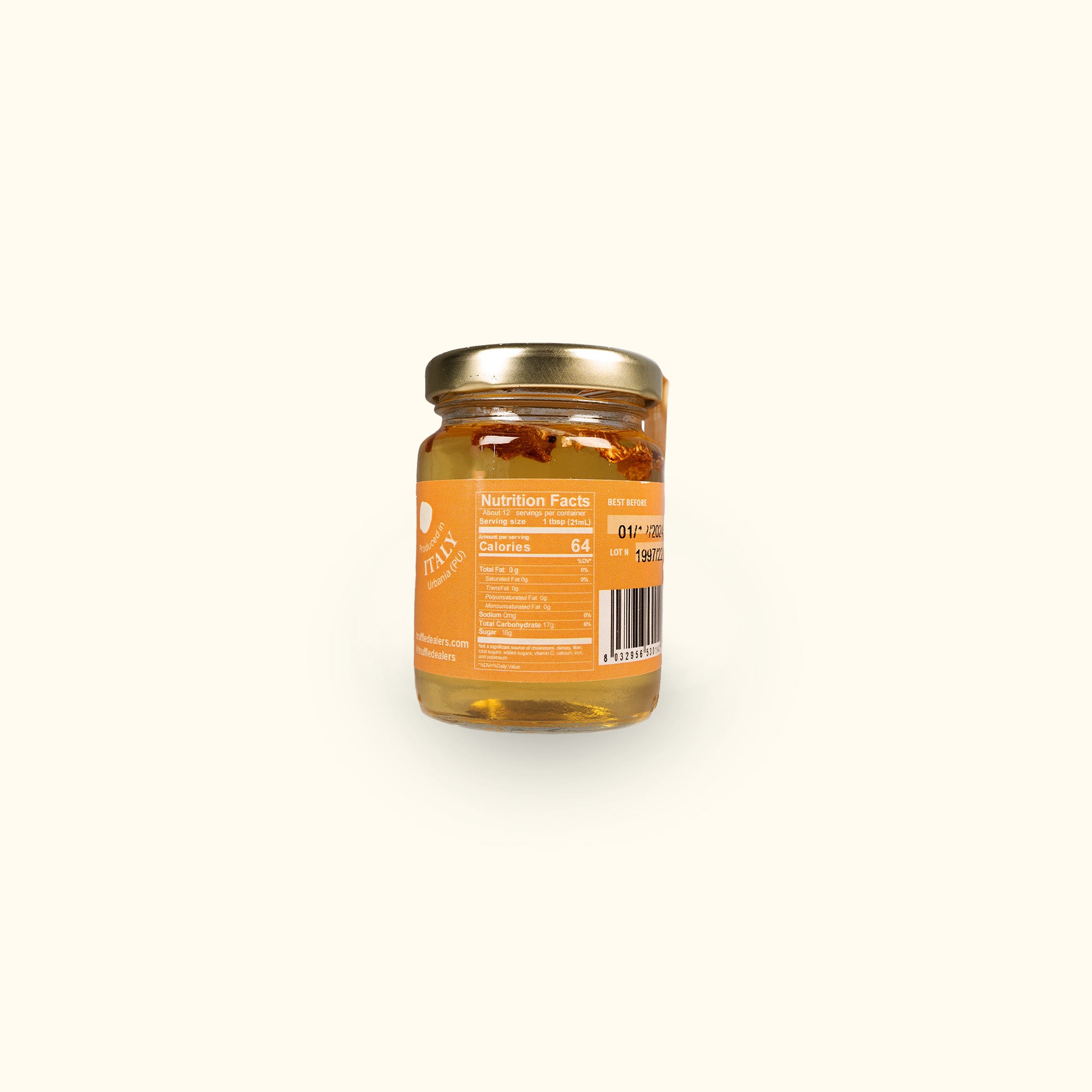 a jar of honey on a white background