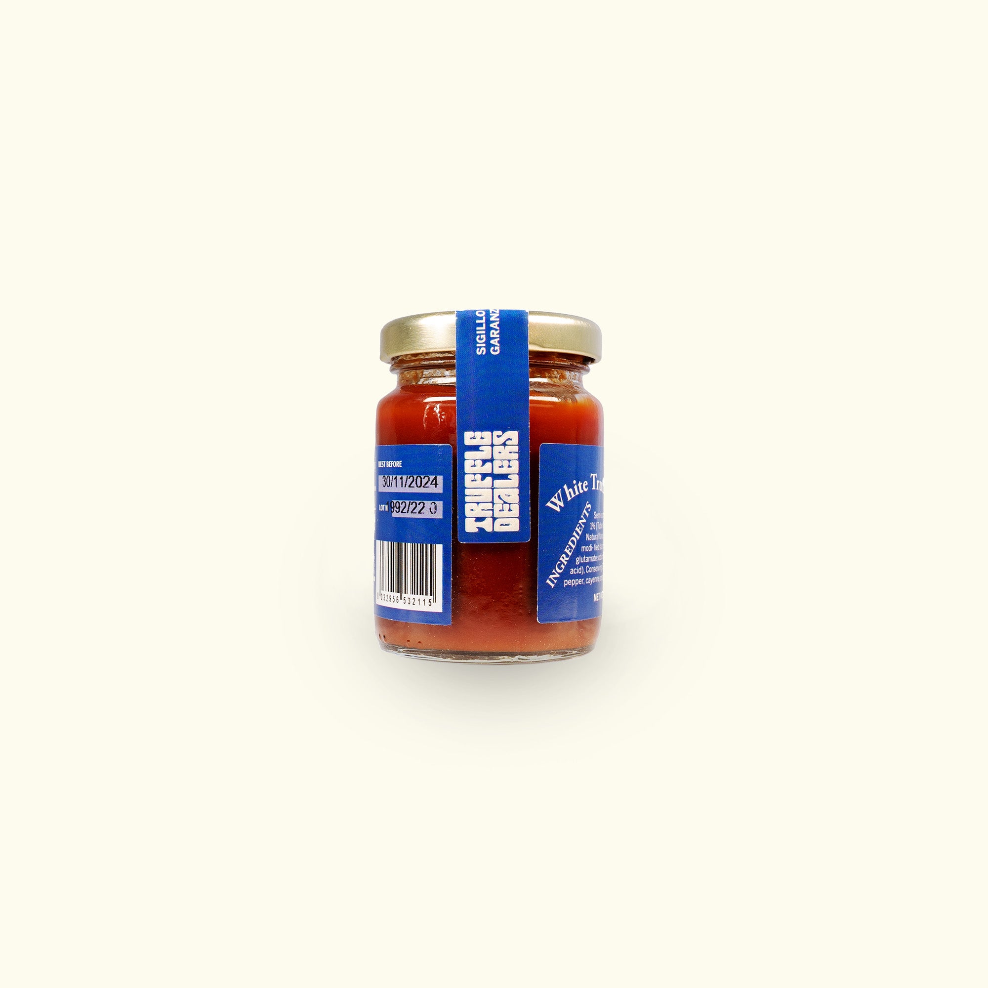 a jar of tomato sauce on a white background